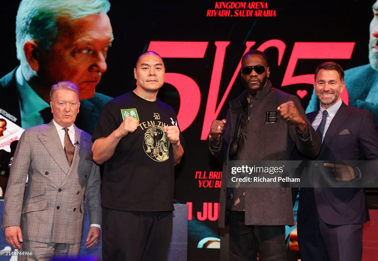 LONDON, ENGLAND - APRIL 15: Zhilei Zhang faces off with Deontay Wilder as Frank Warren and Eddie Hearn look on during the 5v5 press conference ahead of their fight in the Artur Beterbiev and Dmitrill Bivol WBA, WBC, IBF & WBO Light Heavyweight fight at Outernet London on April 15, 2024 in London, England. (Photo by Richard Pelham/Getty Images)