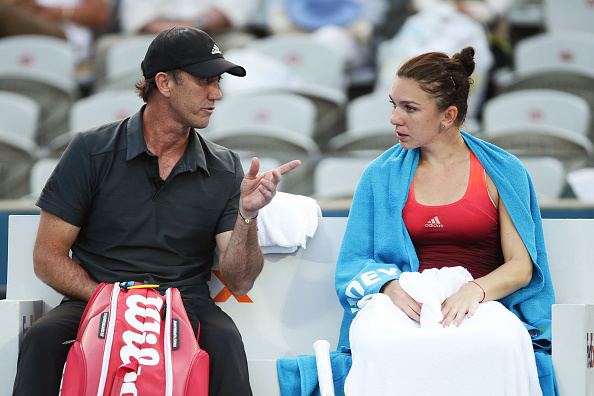 Cahill offers Halep advice during a changeover at the Apia International Sydney in January. Photo credit: Matt King/Getty Images.