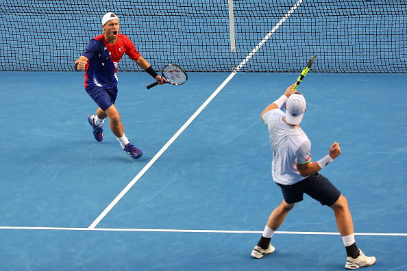 Lleyton Hewitt (left) and Sam Groth celebrate during their second round upset (Photo: Getty Images)