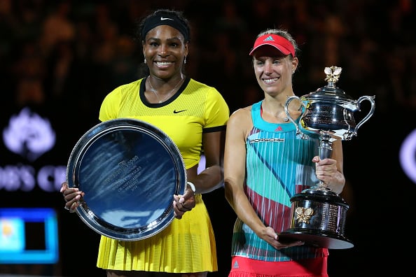 Serena Williams (L) and Angelique Kerber (R) pose for the photographers at the trophy ceremony in the Australian Open. (Photo by Scott Barbour/Getty Images) 