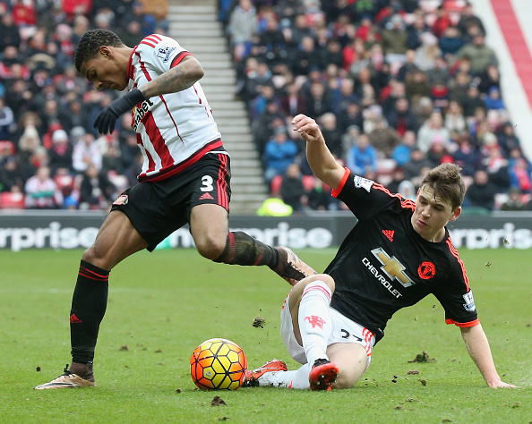 Donald Love tackling Patrick Van Aanholt on his Manchester United debut in their 2-1 defeat to Loce's new club Sunderland | Photo: Getty Images 