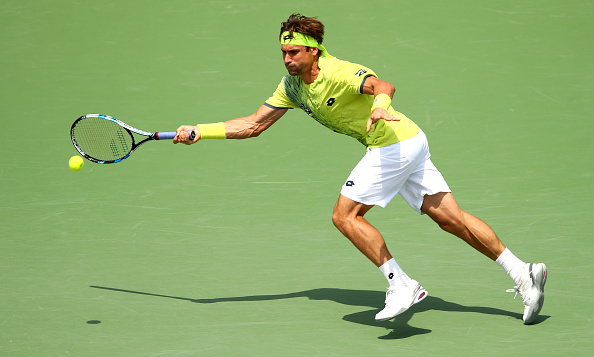 David Ferrer plays a forehand against Taylor Fritz in their second round match during the Miami Open (Photo:Clive Brunskill/Getty Images) 