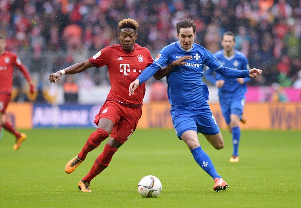 Sandro Sirigu (right) battles with Bayern Munich's David Alaba. (Photo: Lukas Barth/Anadolu Agency/Getty Images)