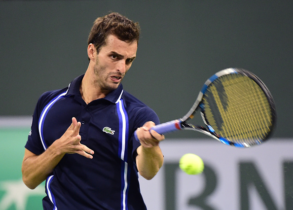 Albert Ramos-Vinolas returns a forehand to Gael Monfils at Indian Wells (Photo:Harry How/Getty Images)