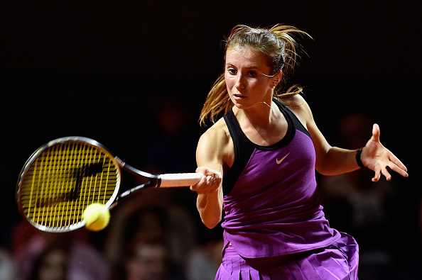 Annika Beck plays a forehand to Angelique Kerber (Photo: Dennis Grombkowski/Getty Images)