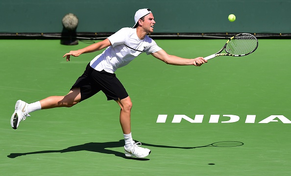 Adrian Mannarino hits a forehand return to Andy Murray1 during their 4th round match at the BNP Paribas Tennis Open. (Photo:Frederic J. Brown/Getty Images)