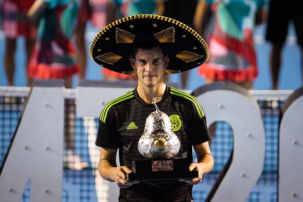 Dominic Thiem poses with the trophy after winning at the Mexican Open.  (Photo by Manuel Velasquez/Anadolu Agency/Getty Images)