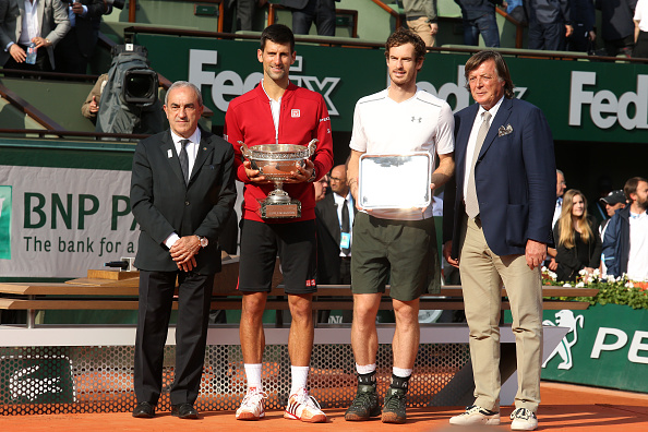 FFT President Jean Gachassin, winner Novak Djokovic, finalist Andy Murray, Adriano Panatta pose during the the trophy ceremony following the Men's Singles final of the 2016 French Open (Photo: Jean Catuffe/Getty Images)