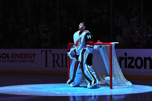 Louis Domingue #35 of the Arizona Coyotes looks on during the National Anthem against the Pittsburgh Penguins at Consol Energy Center on February 29, 2016 in Pittsburgh, Pennsylvania. (Photo by Matt Kincaid/Getty Images)