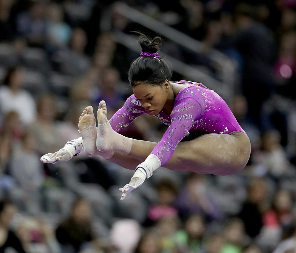 Gabby Douglas performs on the floor exercise at the AT&T American Cup in Newark/Getty Images
