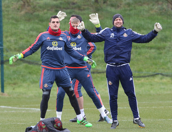 Keeping coach Adrian Tucker (R) warms up the three keepers Vito Mannone, (L) Jordan Pickford and Steven Harper (rear) during a Sunderland training session at the Academy of Light on March 09, 2016 in Sunderland, England. (Photo by Ian Horrocks/Sunderland AFC via Getty Images)