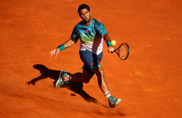 Fernando Verdasco plays a forehand to Juan Monaco at the Mutua Madrid Master (Photo: Clive Brunskill/Getty Images)