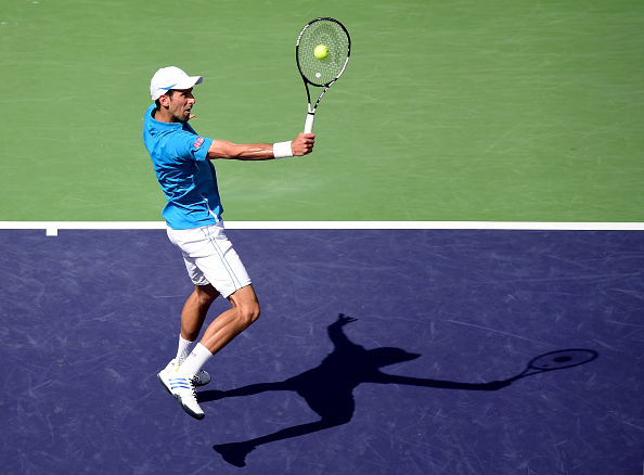 Novak Djokovic hits a backhand during the title match on Sunday (Photo: Getty Images)