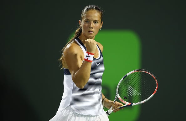 Daria Kasatkina of Russia celebrates a point against Simona Halep of Romania in their second round match during the Miami Open.  | Photo: Getty Images Sport, Clive Brunskill