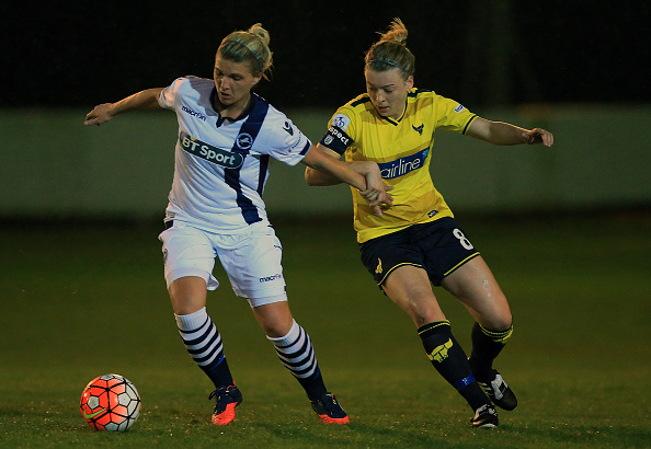 Danielle Carlton (left) resists the pressure of Oxford United's Katherine Nutman. (Photo by Ben Hoskins - The FA/The FA via Getty Images)