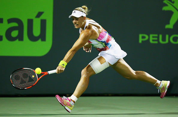 Kerber breaks at the most important time to keep herself in the match | Photo courstesy of: Clive Brunskill