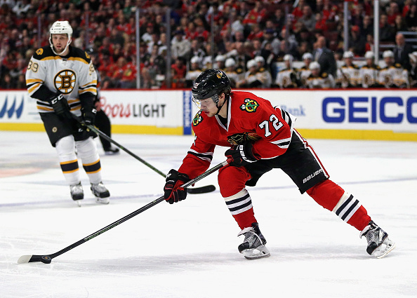 Artemi Panarin #72 of the Chicago Blackhawks controls the puck against the Boston Bruins at the United Center on April 3, 2016 in Chicago, Illinois. The Blackhawks defeated the Bruins 6-4. (Photo by Jonathan Daniel/Getty Images)