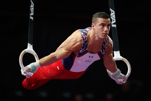 Jake Dalton performs on the still rings at the Pacific Rim Gymnastics Championships in Everett/Getty Images