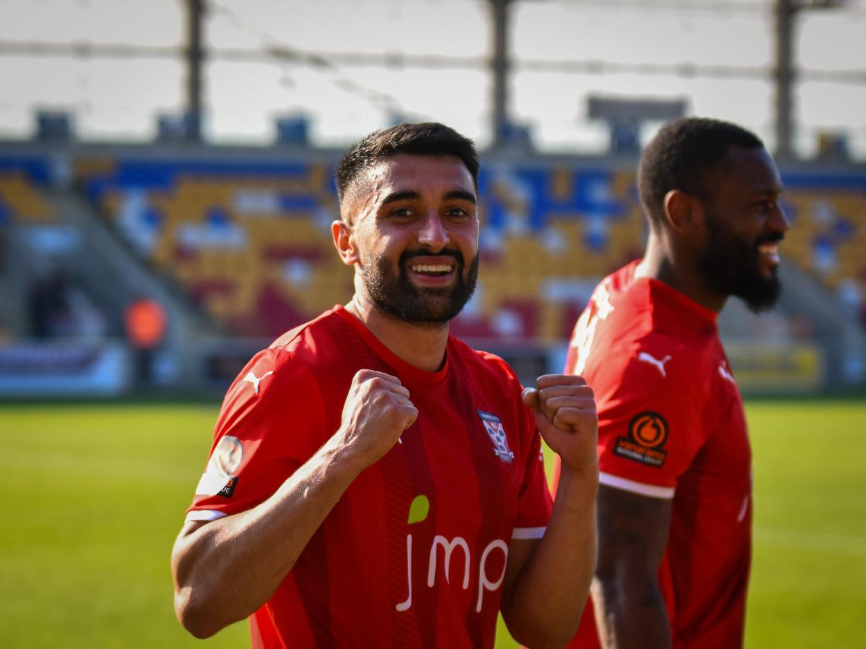 Maz Kouhyar celebrates a win over Spennymoor Town (Photo: Tom Poole)