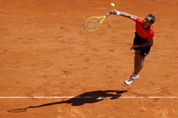 Richard Gasquet serving to Nicolas Almagro (Photo:Valery Hache/Getty Images)