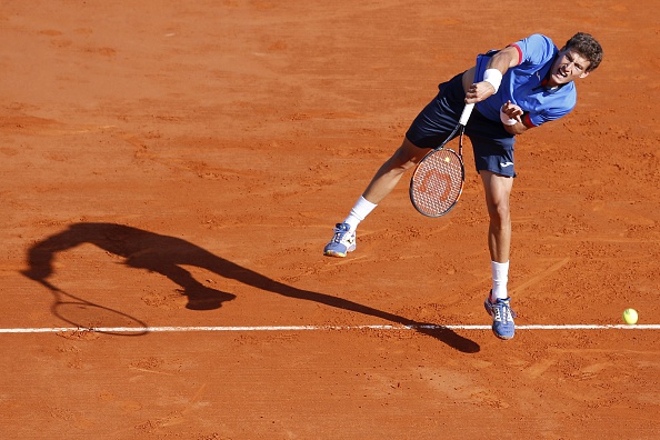 Spain's Pablo Carreno Busta serves to France's Jo-Wilfried Tsonga during the Monte-Carlo ATP Masters tennis match in Monaco on April 12, 2016. AFP PHOTO / VALERY HACHE / AFP / VALERY HACHE (Photo credit should read VALERY HACHE/AFP/Getty Images)
