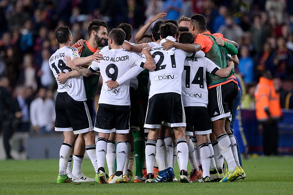 Valencia squad celebrating | Photo: Josep Lago/AFP/Getty Images 