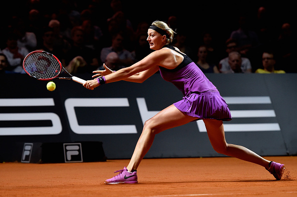 Kvitova reaches for a backhand in her quarterfinal match against Muguruza. Photo credit: Dennis Grombkowski/Getty Images.