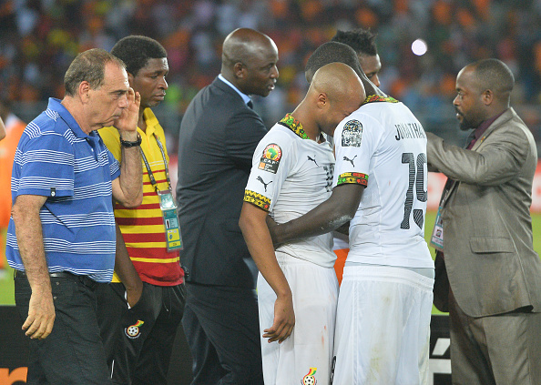 Jonathan Mensah consoles André Ayew as Ghana lose out to the Ivory Coast in the 2015 AFCON final. (Photo: Liewig Christian/Corbis via Getty Images)