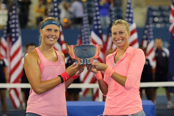 Hradecka (left) and Hlavackova (right) with the 2013 US Open women's doubles trophy, their most recent Grand Slam title. Photo credit: Tim Clayton/Getty Images.
