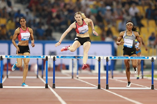 Eilidh Doyle (C) competes in the women's 400 metres hurdles final as at the Diamond League