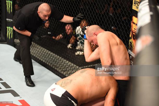 Struve (R) landed a series of vicious elbows to defeat Bigfoot in 18 seconds | Photo: Getty/JoshHedges/ZuffaLLC