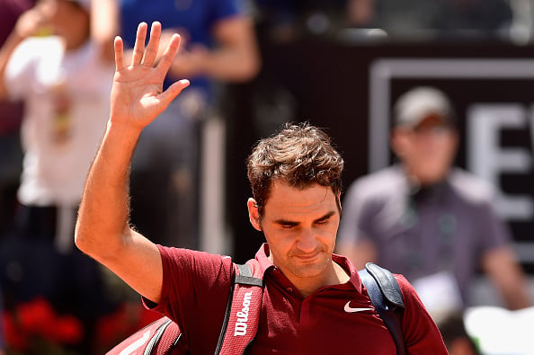 Roger Federer waves goodbye after a third round loss at the Internazionali BNL d'Italia in Rome/Getty Images