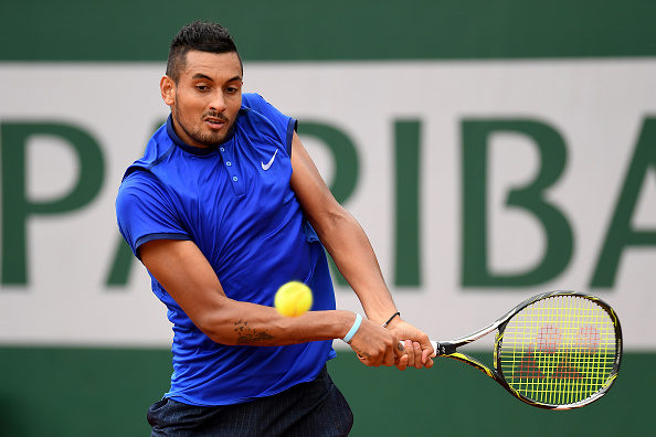 Nick Kyrgios hits a backhand at the French Open in Paris/Getty Images