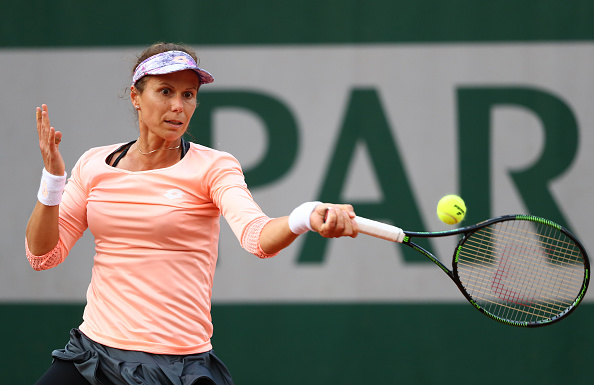 Varvara Lepchenko hits a forehand during the French Open. (Photo by Julian Finney/Getty Images)