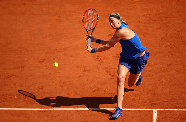 Kvitova plays a backhand in her match against Hsieh Wednesday. Photo credit: Clive Brunskill/Getty Images.