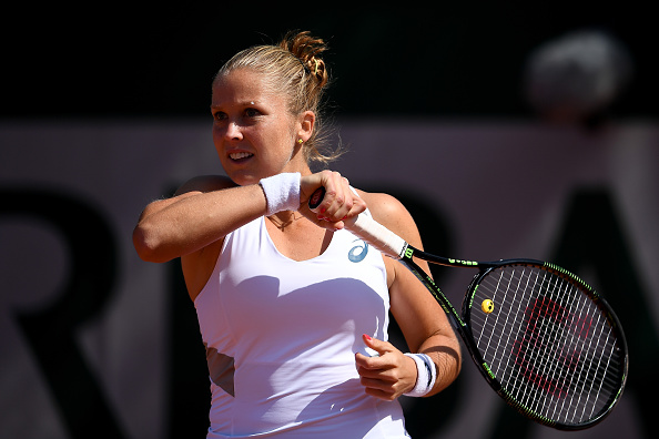 Rogers returns a forehand to Vesnina in their second round clash. Photo credit: Dennis Grombkowski/Getty Images.