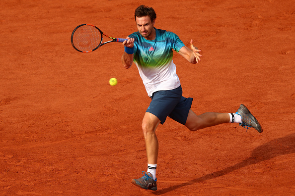 Ernests Gulbis hitting a forehand shot (Photo: Julian Finney/Getty Images)