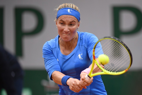 Kuznetsova comes up with a big hold to keep the match on serve | Photo: Martin Bureau/Getty Images