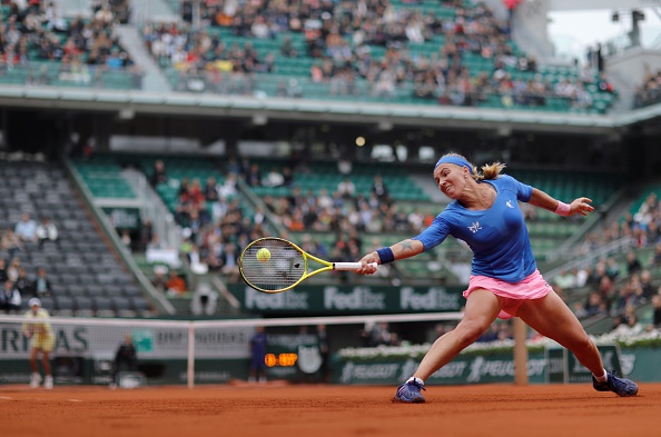 Kuznetsova finds the break back but loses serve immediately | Photo: Thomas Samson/Getty Images