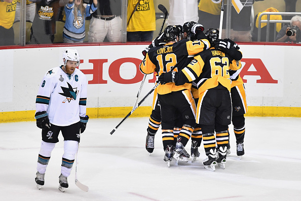 Nick Bonino is mobbed by his teammates after scoring the eventual game-winning goal with 2:33 left in regulation/Photo: Jamie Sabau/Getty Images