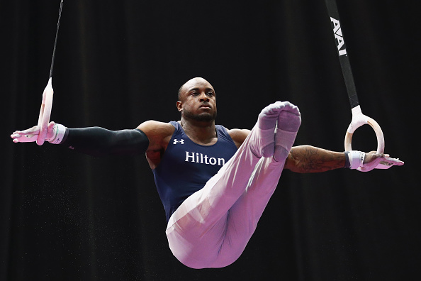 Donnell Whittenburg performs on the still rings at the P&G Men's Gymnastics Championships in Hartford/Getty Images