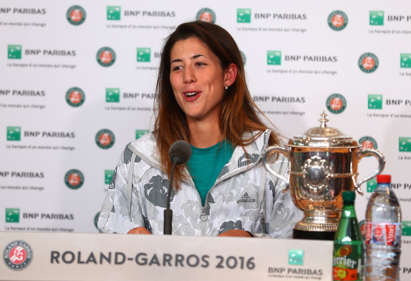 A cheerful Muguruza speaks to the press after the final, the Spaniard now has three singles titles to her name. Photo credit: Julian Finney/Getty Images.