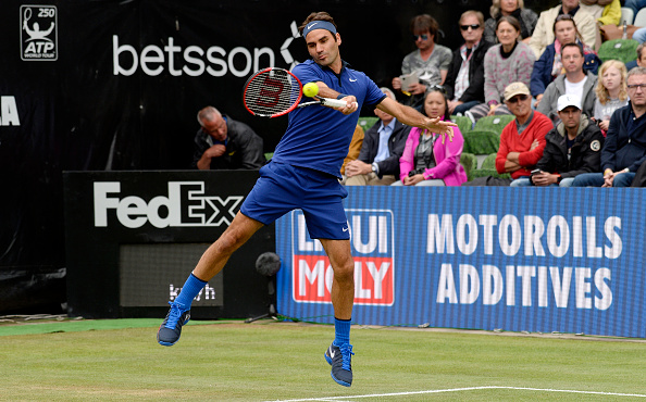 Federer crushes a forehand return for a winner. Credit: Daniel Kopatsch/Getty Images