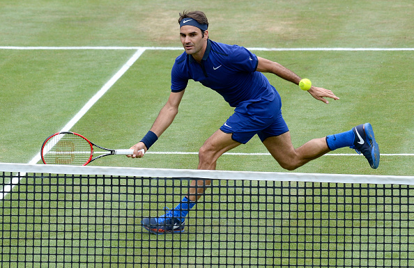 The world number three delicately places a volley just over the net. Credit: Daniel Kopatsch/Getty Images