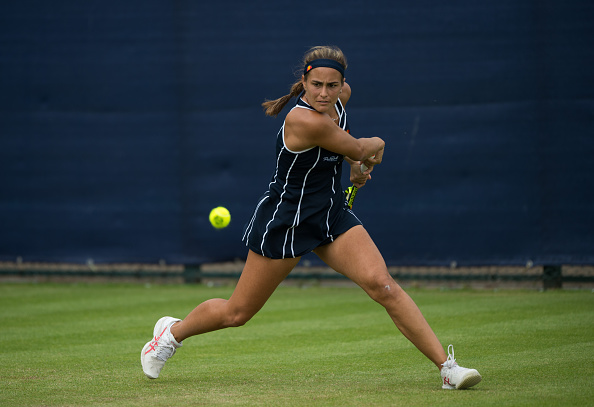 As with the first set, Puig raced out to a quick 3-0 lead, only to see Paszek recover to level the set before the Puerto Rican closed strong to capture the match/Photo Source: Jon Buckle/Getty Images