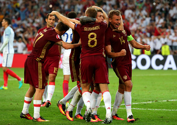 Russia celebrate their last gasp equaliser. (Photo: Alex Livesey/Getty Images)