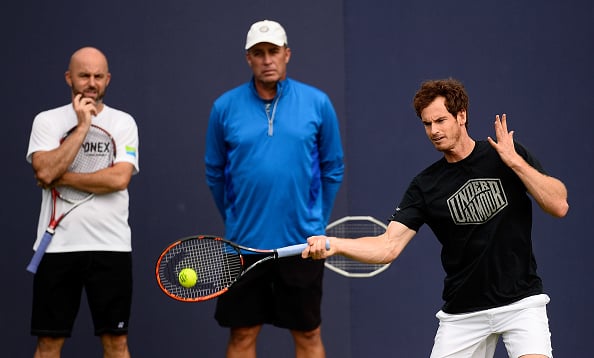 Andy Murray hits a forehand at practice under the watchful eyes of Ivan Lendl and Jamie Delgado/Getty Images