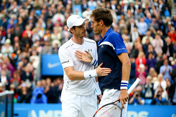 Murray and Mahut embrace at the net. (Photo: Jordan Mansfield/Getty)