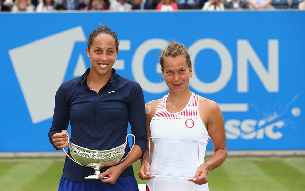 Keys (left) and runner-up Barbora Strycova pose with their silverware after the trophy presentation ceremony in Birmingham last weekend. Photo credit: Steve Bardens/Getty Images.