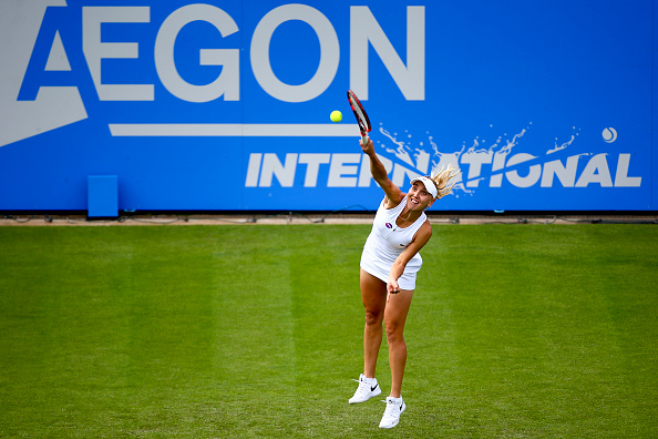 Elena Vesnina serves during her first round match against Heather Watson at the Aegon International. (Photo by Jordan Mansfield/Getty Images for LTA)